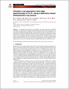 Ultrafast x-ray absorption near edge spectroscopy of Fe3O4 using a laboratory based femtosecond x-ray source