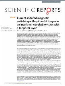 Current-induced magnetic switching with spin-orbit torque in an interlayer-coupled junction with a Ta spacer layer