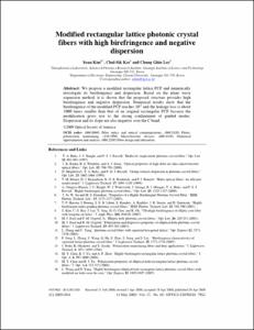 Modified rectangular lattice photonic crystal fibers with high birefringence and negative dispersion